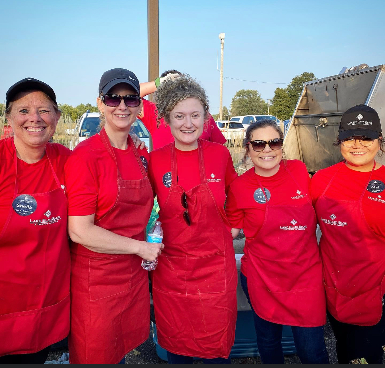 Image of the team handing out roasted corn